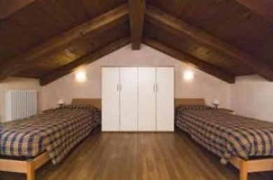 Lägenhetshotell La Tana Del Ghiro 3*